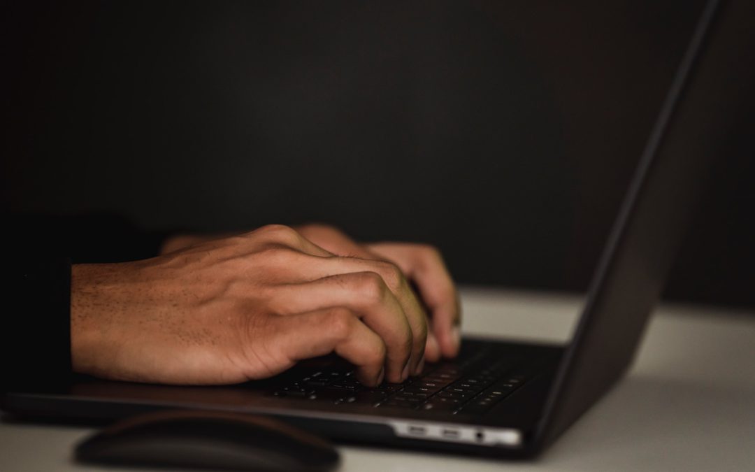 Person working on crm software in healthcare