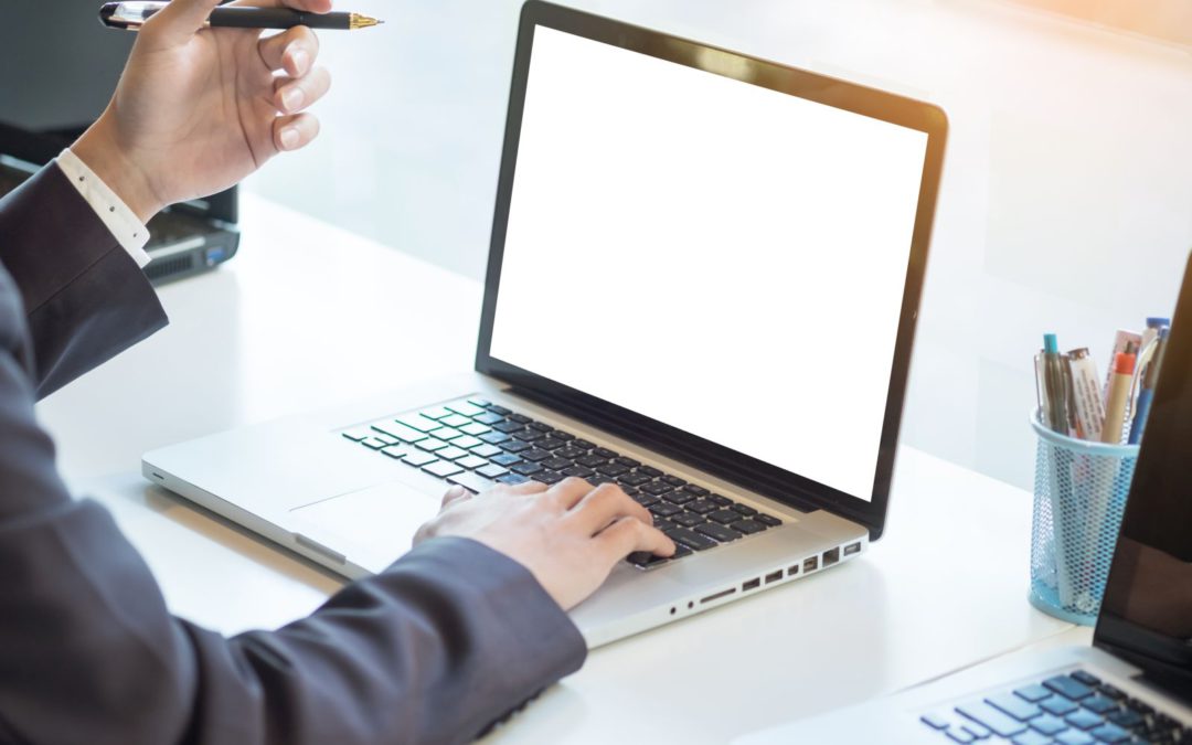 Man working on laptop for salesforce